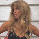 Perruque éclatante blond doré avec frange